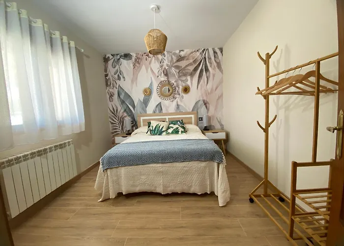 Casitas El Raso * Aldeamayor de San Martin